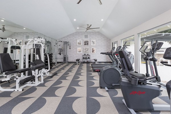 Modern fitness center with state-of-the-art equipment at The Joshua Apartments for a healthy lifestyle