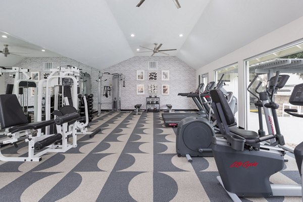 fitness center at The Joshua Apartments