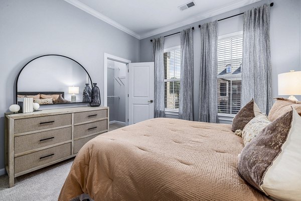 Modern bedroom with plush furnishings at Griffin Weston Apartments
