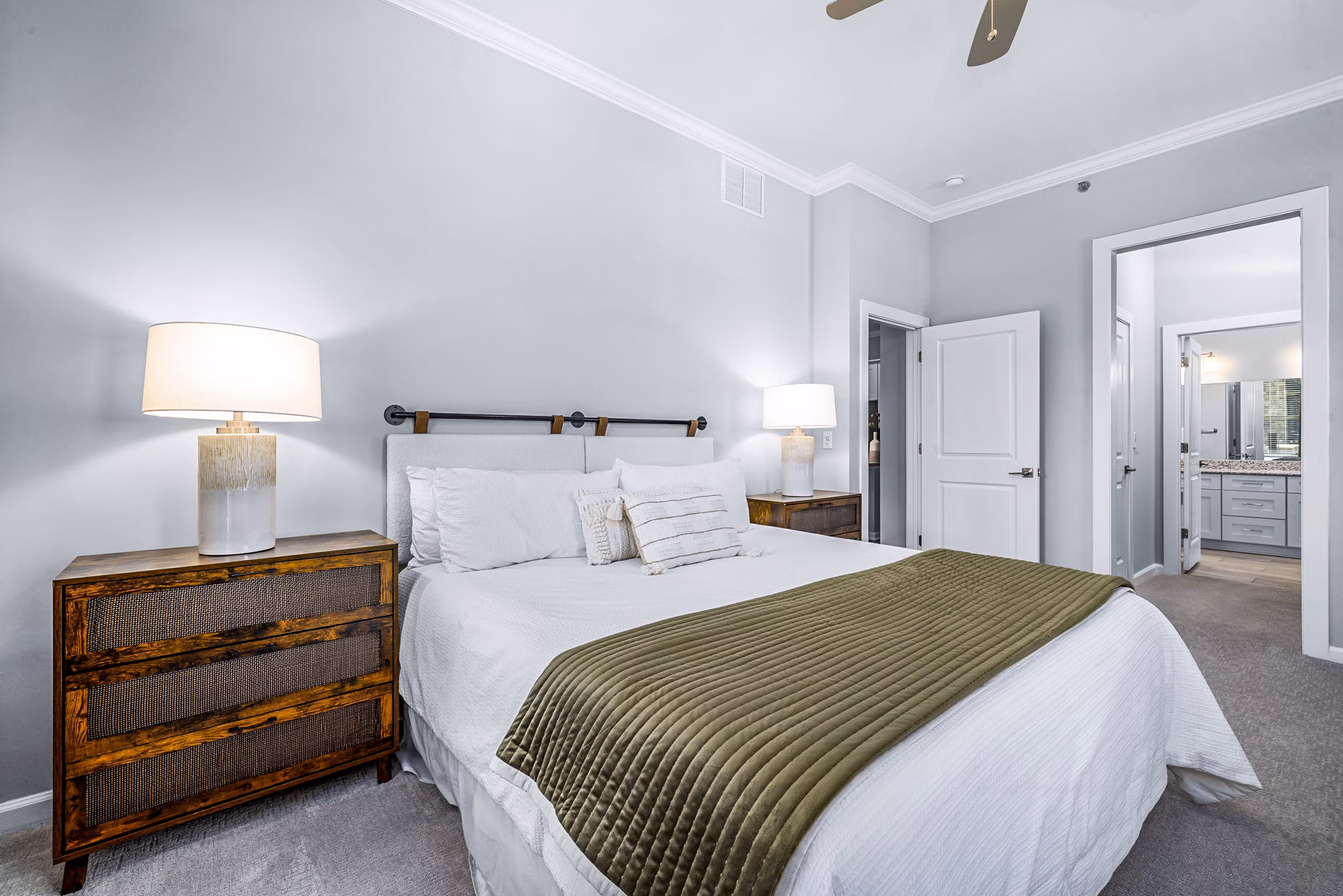 Modern bedroom with elegant furnishings at Griffin Weston Apartments