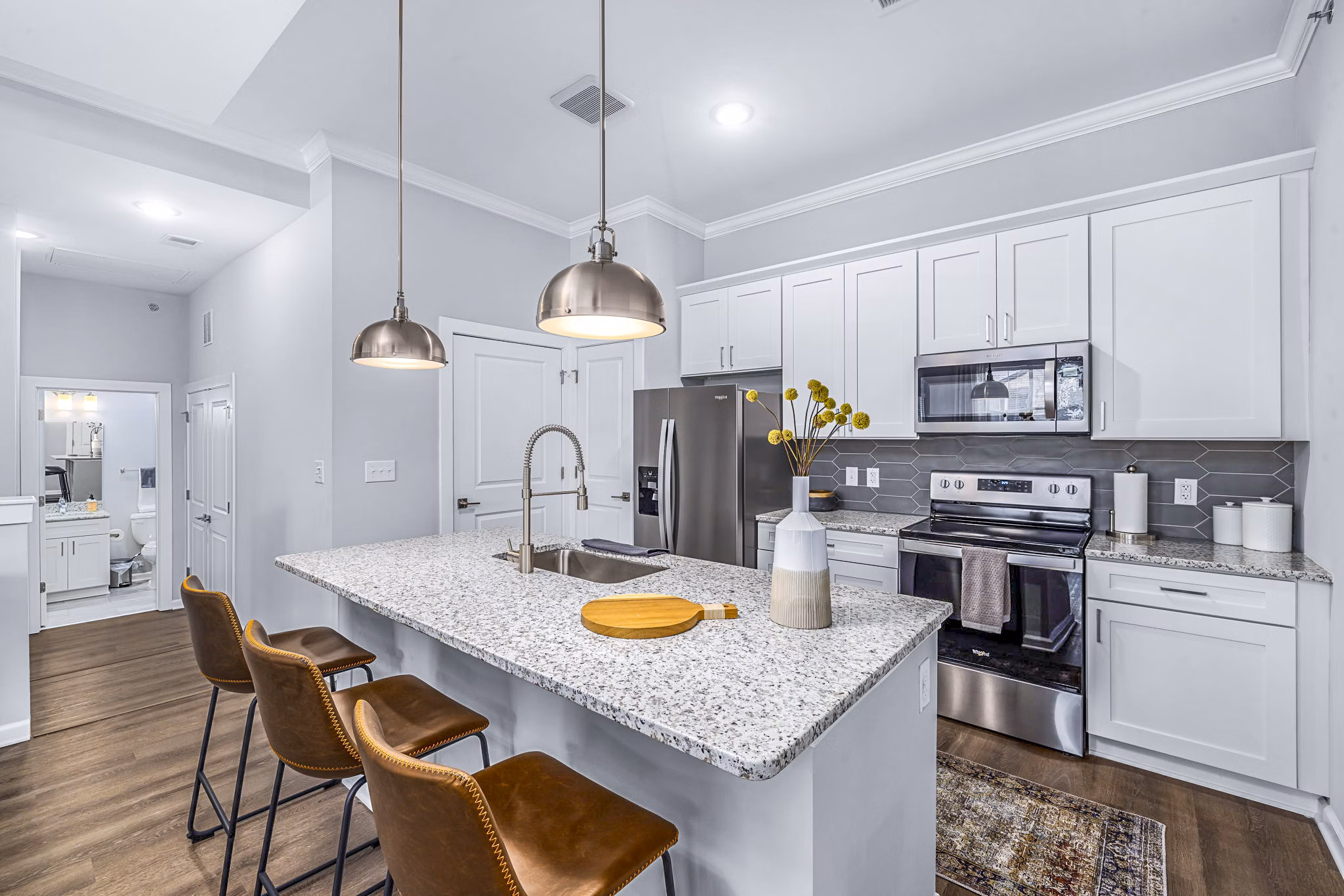 Modern kitchen with stainless steel appliances at Griffin Weston Apartments, Greystar luxury community