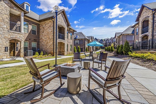 Cozy fire pit on patio at Griffin Weston Apartments offers luxury outdoor relaxation