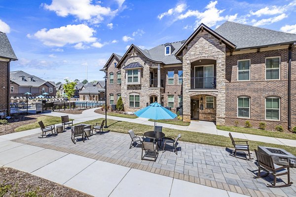 Griffin Weston Apartments: Stylish outdoor patio with modern seating in a vibrant community