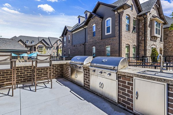 Outdoor grill area at Griffin Weston Apartments' patio, perfect for entertaining and relaxing in a luxury setting
