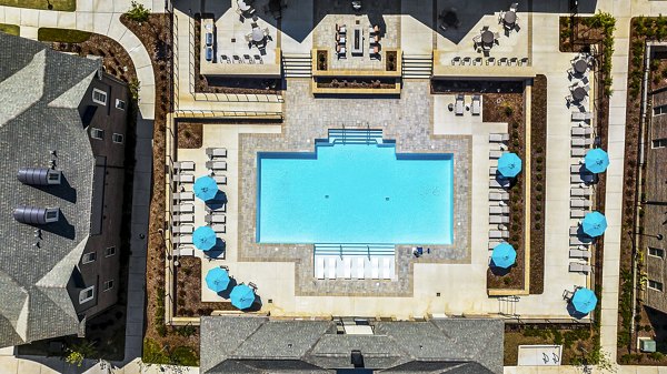 Resort-style pool with lounge chairs at Griffin Weston Apartments