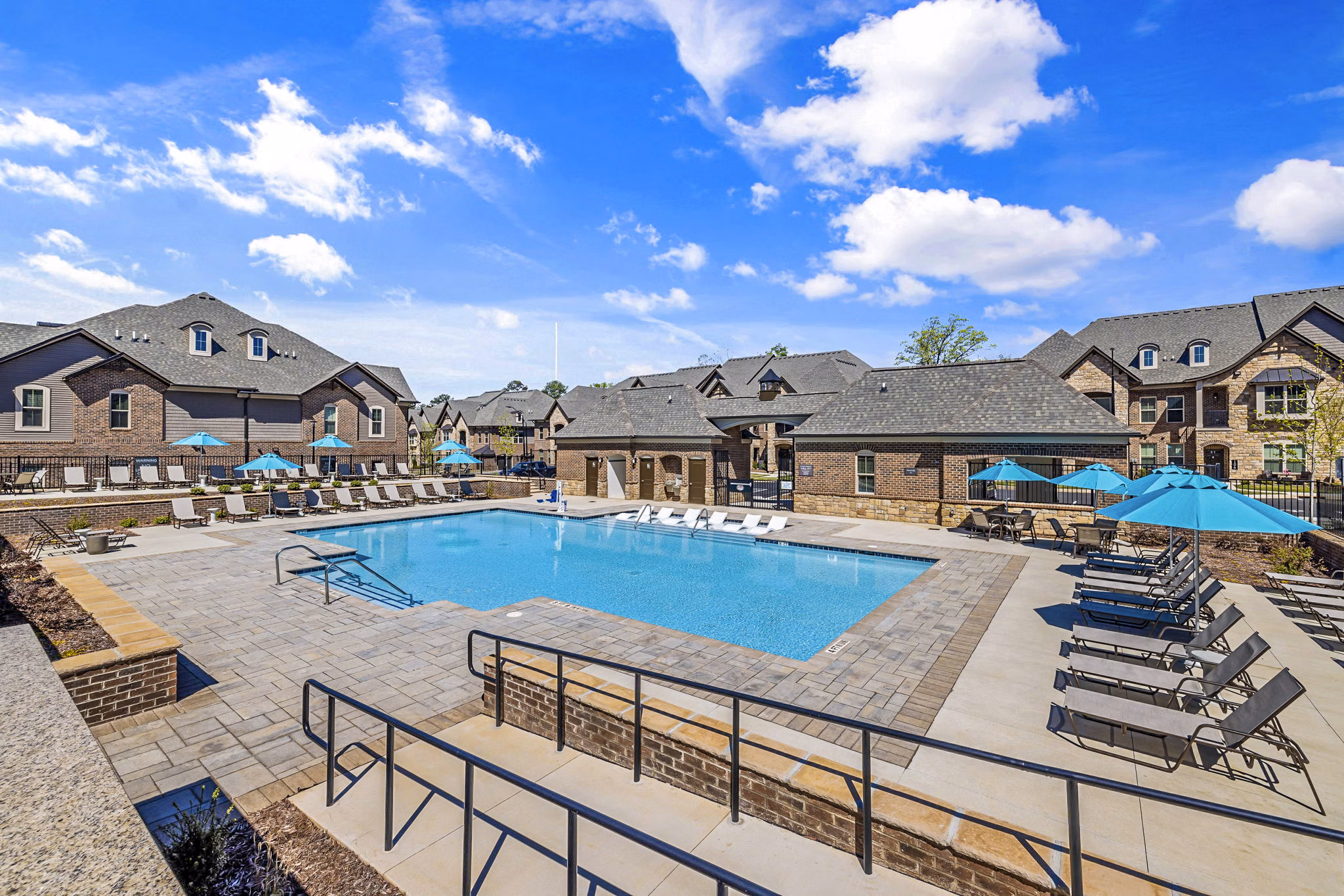 Luxurious pool surrounded by modern landscaping at Griffin Weston Apartments, a Greystar luxury community