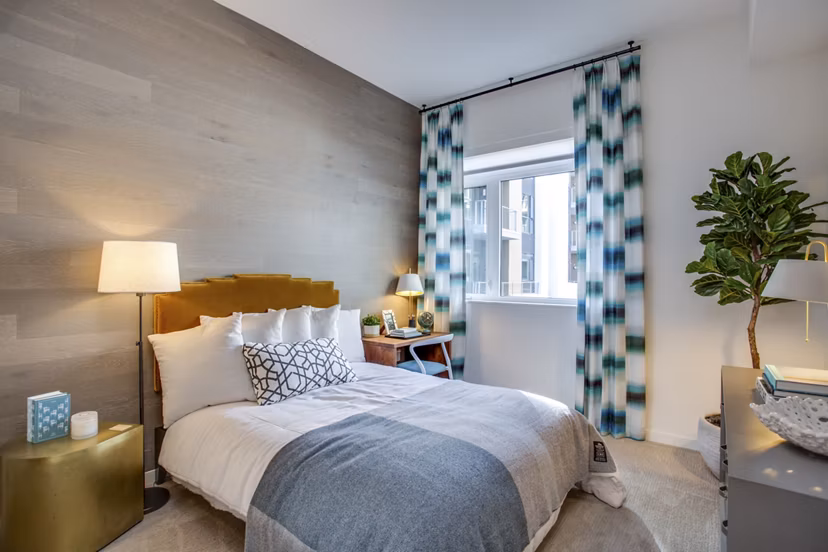 Cozy bedroom with ocean views in Oceanaire Apartments