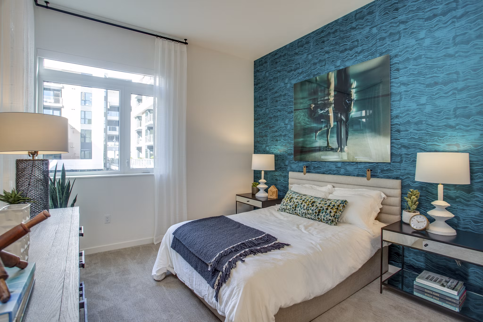 Modern bedroom with ocean view at Oceanaire Apartments