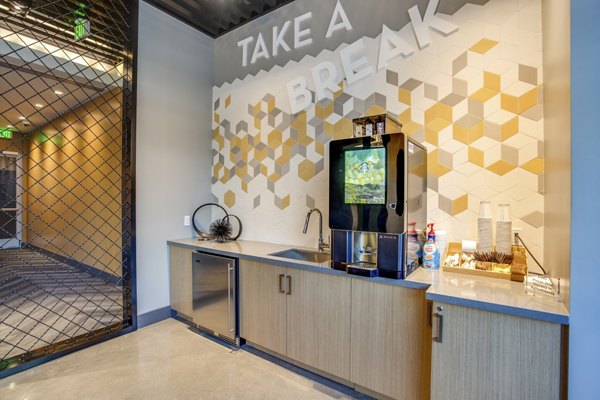 Oceanaire Apartments: Modern clubhouse with stylish seating areas and game room amenities