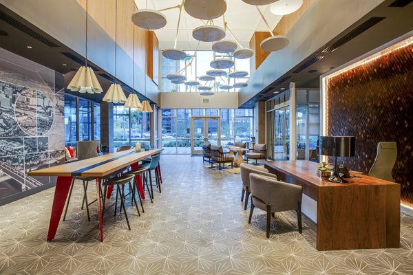 Oceanaire Apartments clubhouse: Elegant space with modern dÃ©cor and plentiful seating options in luxury apartment community