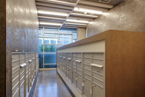 Mail room featuring secure package lockers at Oceanaire Apartments