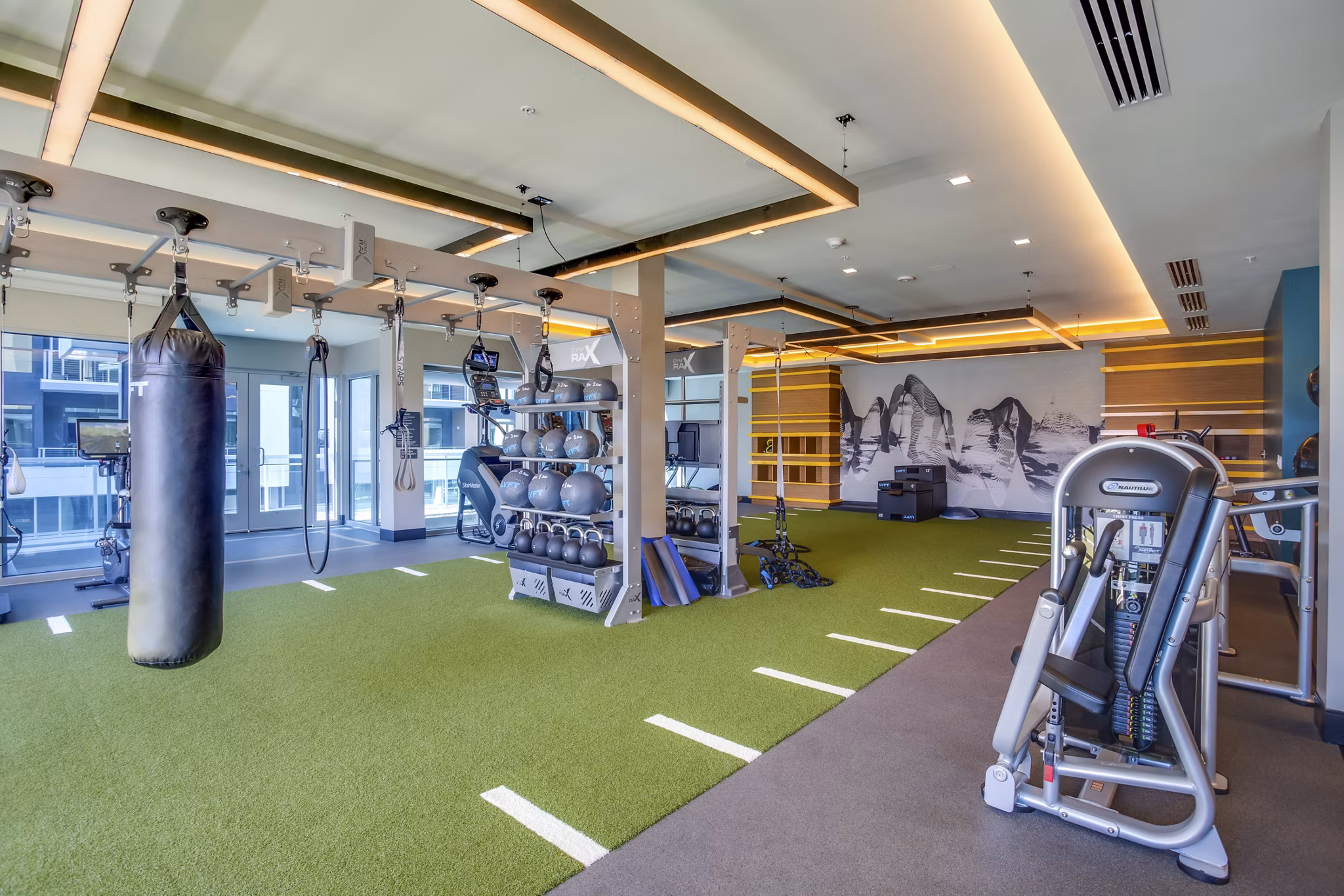 Fitness center with modern equipment at Oceanaire Apartments offering wellness and exercise spaces for residents