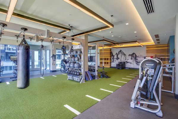 Fitness center with modern equipment at Oceanaire Apartments offering wellness and exercise spaces for residents