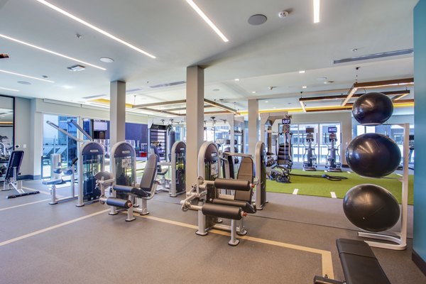 Oceanaire Apartments: State-of-the-art fitness center equipped with modern cardio and strength training machines
