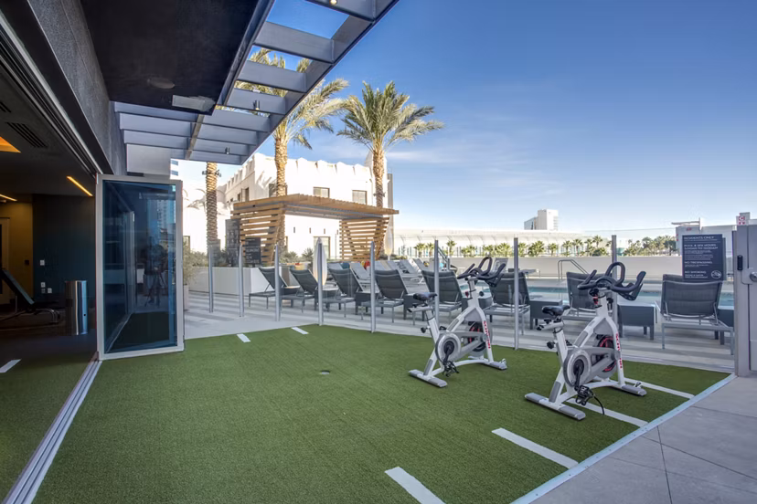 State-of-the-art yoga/spin studio with mirrored walls at Oceanaire Apartments for fitness enthusiasts