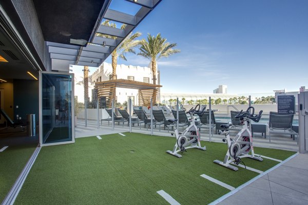 State-of-the-art yoga/spin studio with mirrored walls at Oceanaire Apartments for fitness enthusiasts