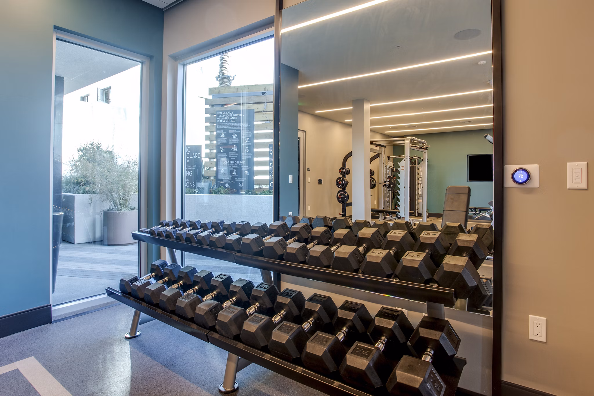 Modern fitness center with state-of-the-art equipment at Oceanaire Apartments, offering luxury amenities for an enhanced lifestyle