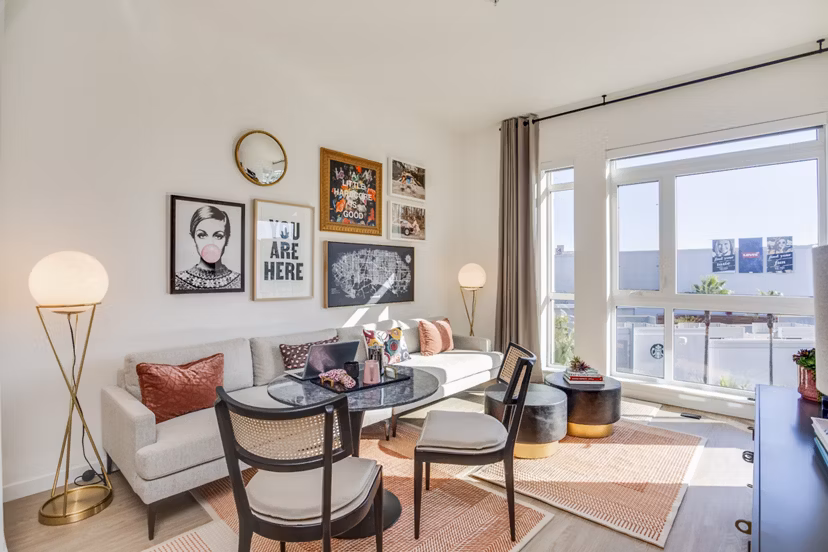 Living room with coastal-themed decor at Oceanaire Apartments, luxury apartments by the beach for a relaxed living experience