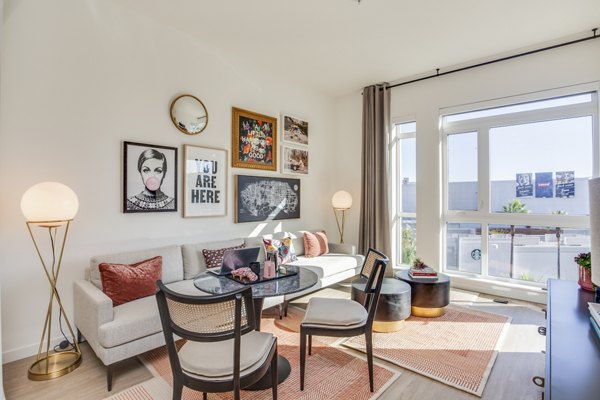 Living room with coastal-themed decor at Oceanaire Apartments, luxury apartments by the beach for a relaxed living experience