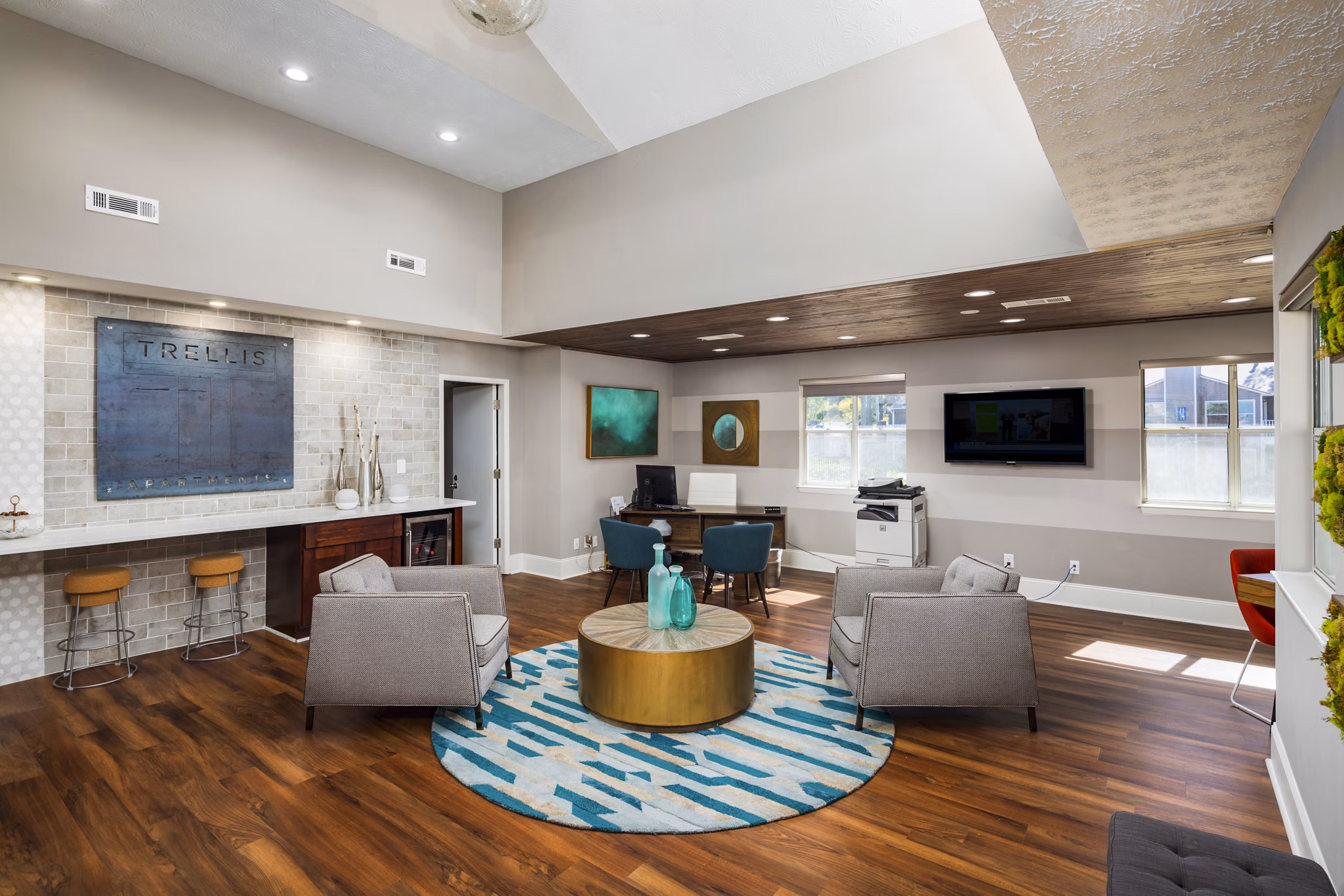 Trellis Apartments: Elegant clubhouse lobby featuring modern dÃ©cor and comfortable seating