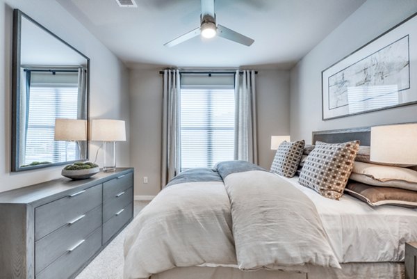 Bedroom featuring modern design and cozy atmosphere at Citadel at Lookout Apartments