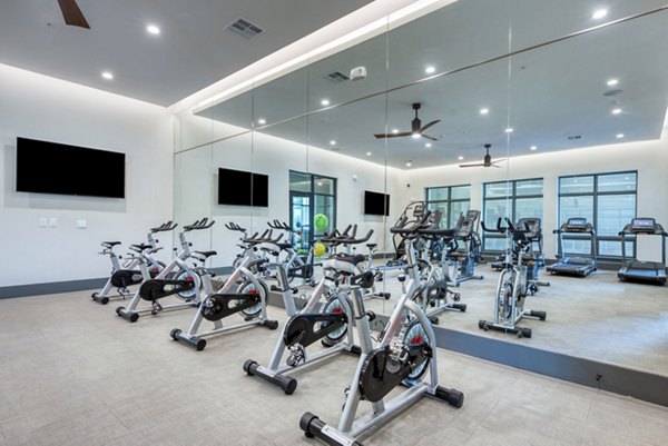 State-of-the-art spin studio with modern equipment at Citadel at Lookout Apartments, a Greystar luxury property