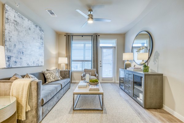 Spacious living room with modern decor at Citadel at Lookout Apartments