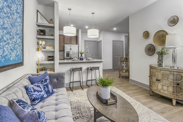 Modern living room with stylish furnishings and natural light at Verde at McCullough Station Apartments