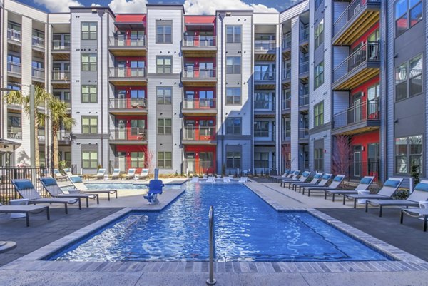 Rooftop pool with city views at Verde at McCullough Station Apartments