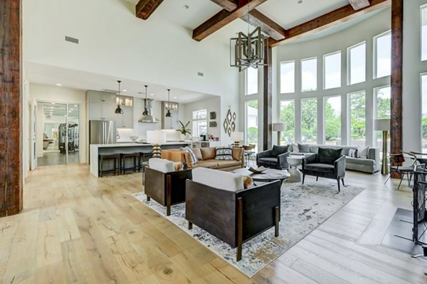 Clubhouse featuring modern design and open seating at Blu on the Boulevard Apartments