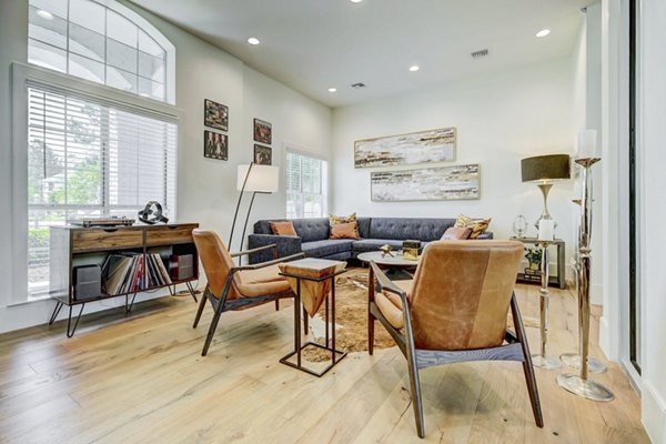 Clubhouse featuring modern lounge and recreation area at Blu on the Boulevard Apartments