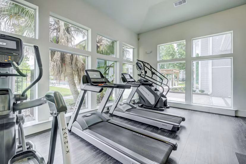 Fitness center with modern equipment at Blu on the Boulevard Apartments