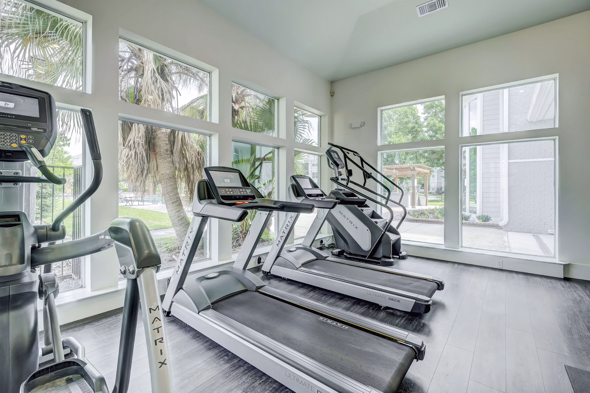 Fitness center with modern equipment at Blu on the Boulevard Apartments