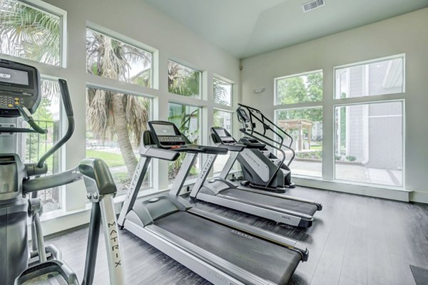Fitness center with modern equipment at Blu on the Boulevard Apartments