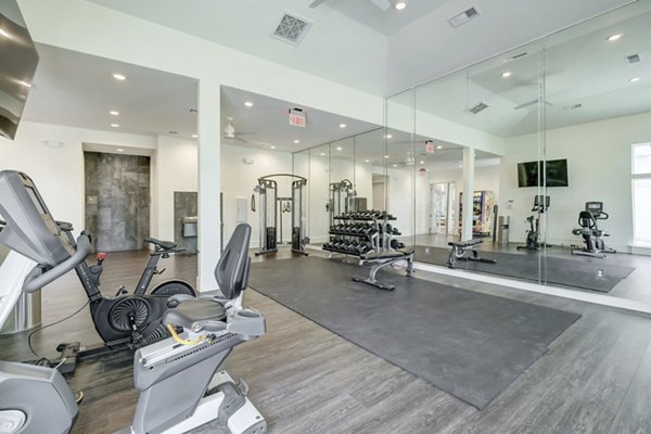 Modern fitness center with state-of-the-art equipment at Blu on the Boulevard Apartments for active lifestyle enthusiasts
