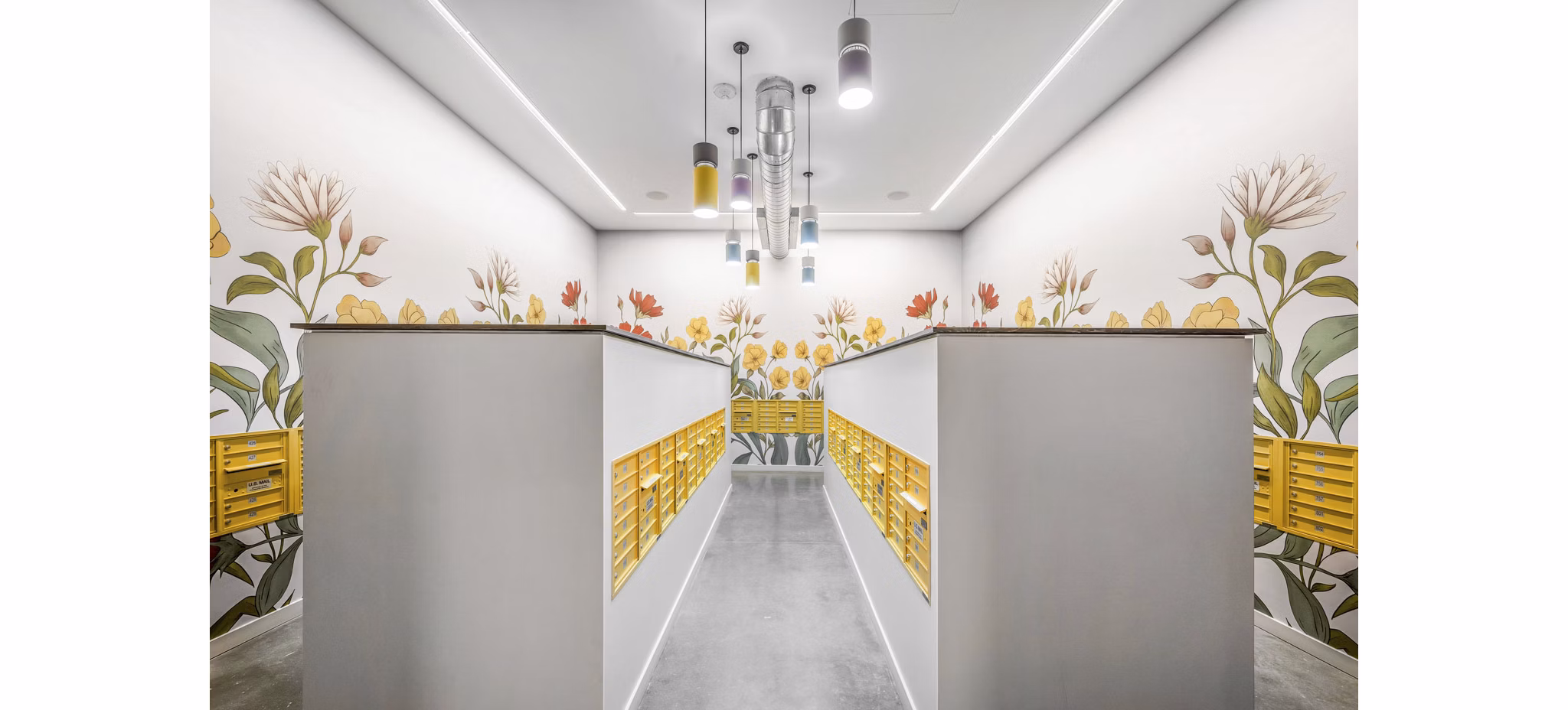 Modern mail room with parcel lockers at Miscela Apartments, offering efficient package management for residents