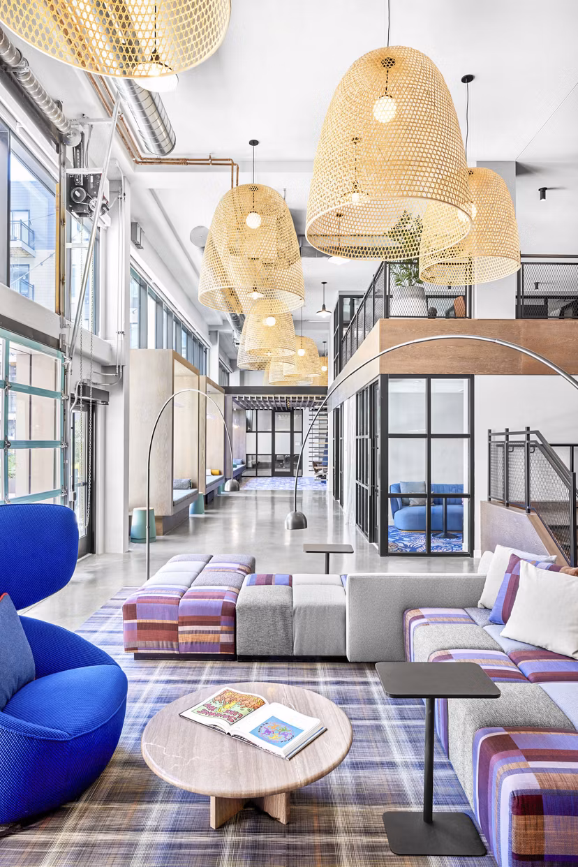 Luxury clubhouse featuring modern design and lounge areas at Miscela Apartments
