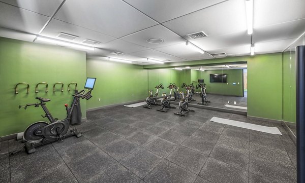 State-of-the-art spin studio at Miscela Apartments: Engage in energizing fitness sessions at this premier fitness center