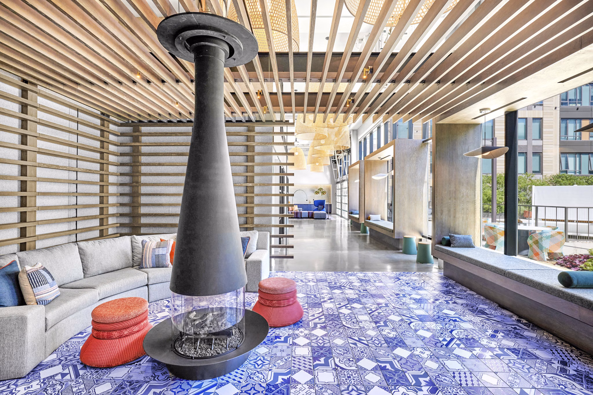 Outdoor patio with cozy fire pit at Miscela Apartments