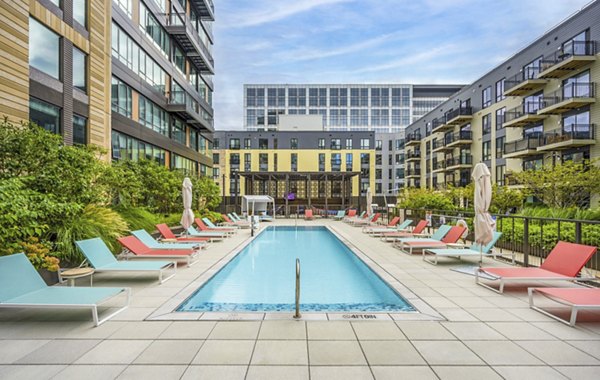 Rooftop pool with skyline views at Miscela Apartments