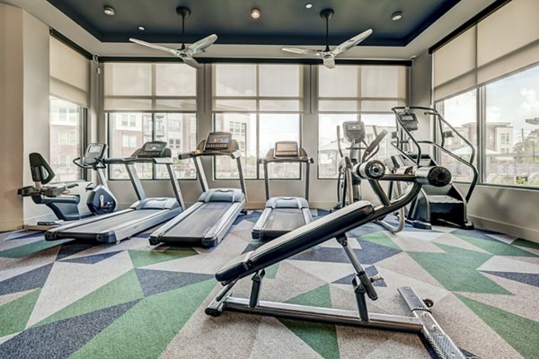 fitness center at Encore Rise Apartments