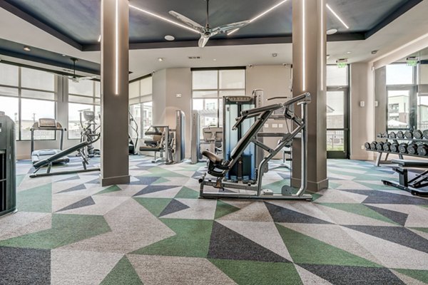 fitness center at Encore Rise Apartments