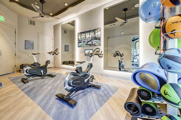 fitness center at Encore Rise Apartments