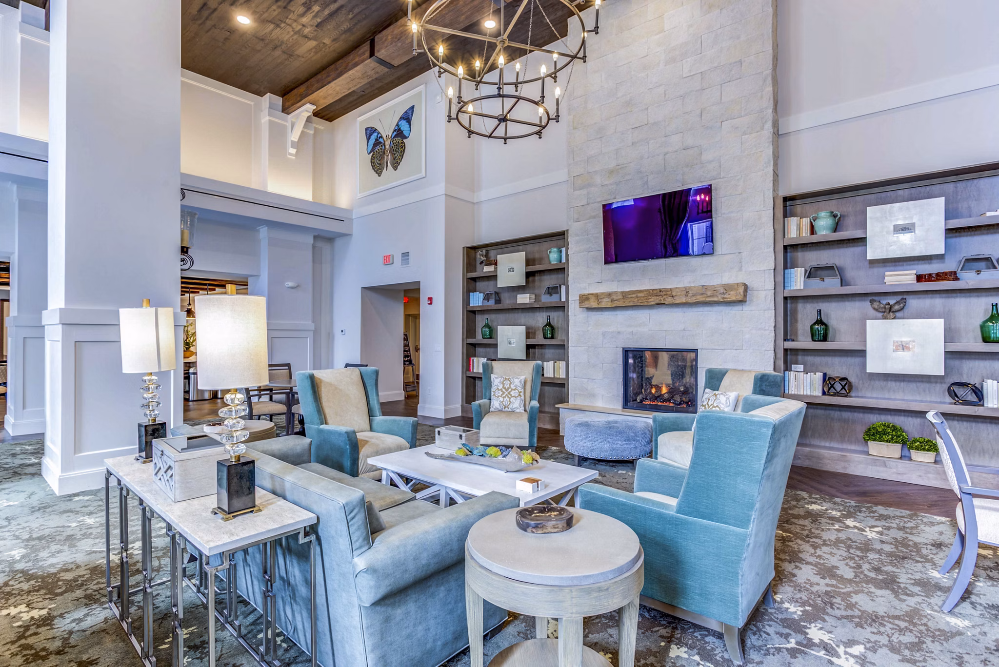 Elegant clubhouse with cozy seating areas at Everleigh Naperville Apartments