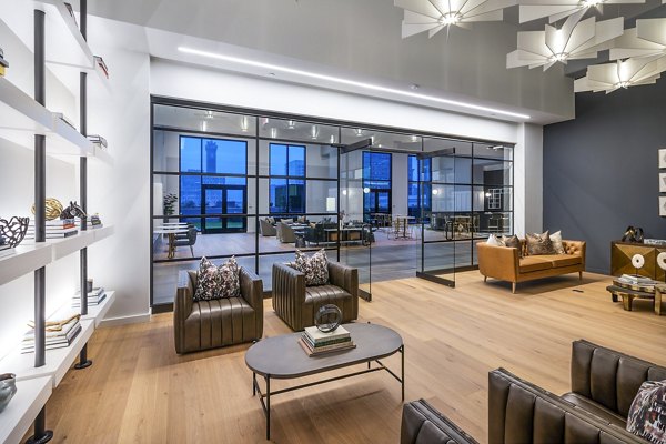 Clubhouse lobby with modern decor and seating areas at Ascent Peachtree Apartments