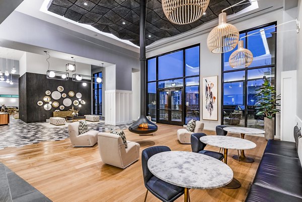 Clubhouse featuring modern furnishings and vibrant decor at Ascent Peachtree Apartments