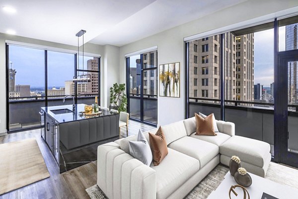 Spacious living room with modern decor in Ascent Peachtree Apartments