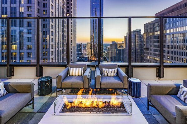 Cozy fire pit on the patio at Ascent Peachtree Apartments, offering a relaxing outdoor experience for residents