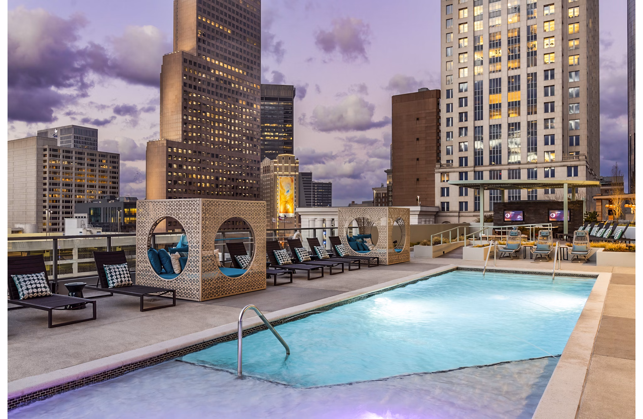 Expansive pool with lounge area at Ascent Peachtree Apartments, perfect for relaxation in the heart of the city