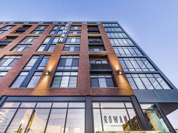 Rowan Apartments: Contemporary building featuring sleek design and urban landscaping in central location